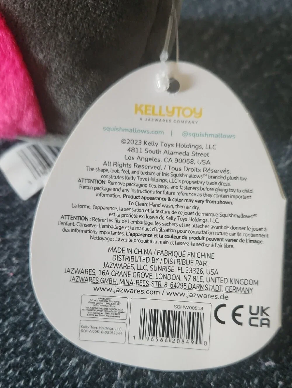 Squishmallows Gray Plush Cat Toy with Bright Pink Accents